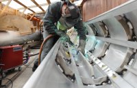 Welding the interior of the Schooner Atlantic's foremast...