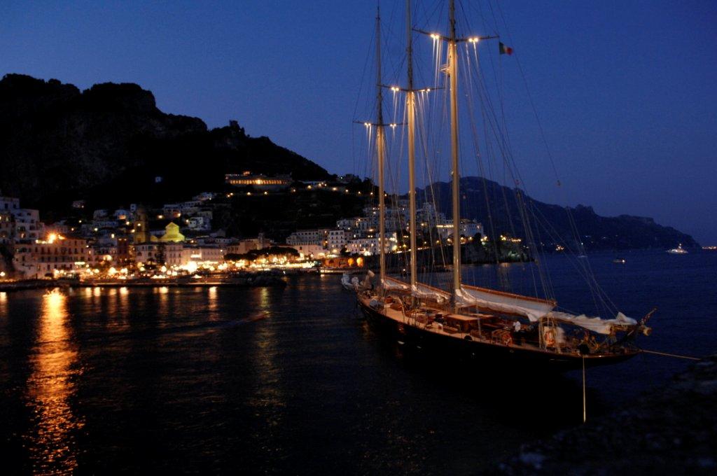 The schooner Atlantic berthed in the Port of Amalfi, Italy.